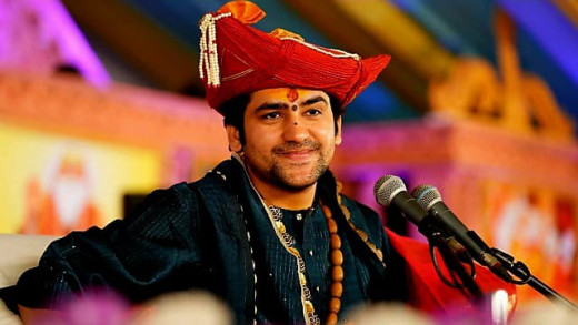 धीरेंद्र शास्त्री का उदित राज पर पलटवार, कहा मेरा बैकग्राउंड नहीं जानते उदित राज